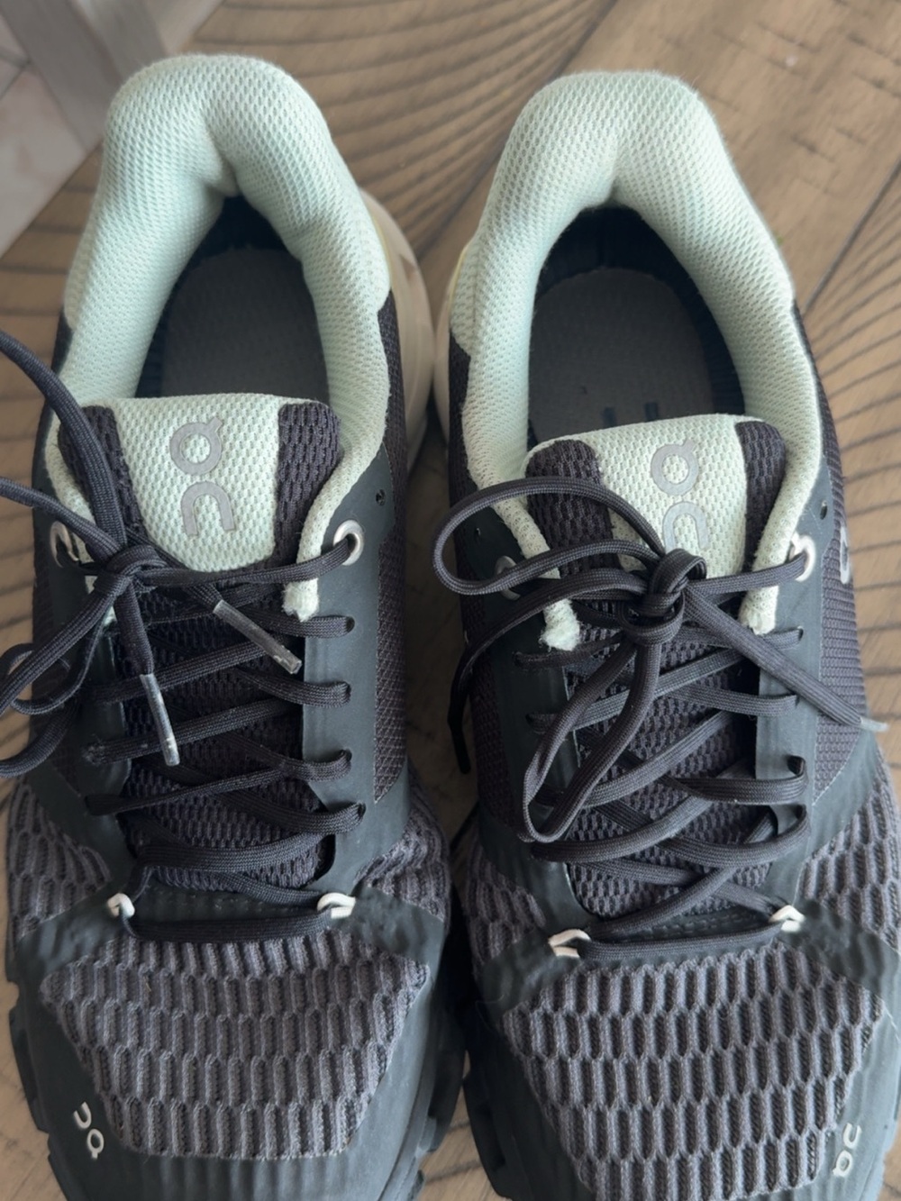 On Running women Athletic Sneakers in Black and Light Green